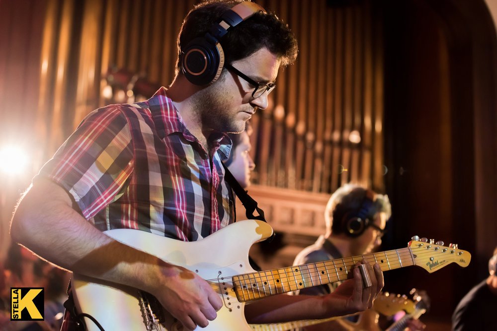 Bob Lanzetti playing guitar with Snarky Puppy