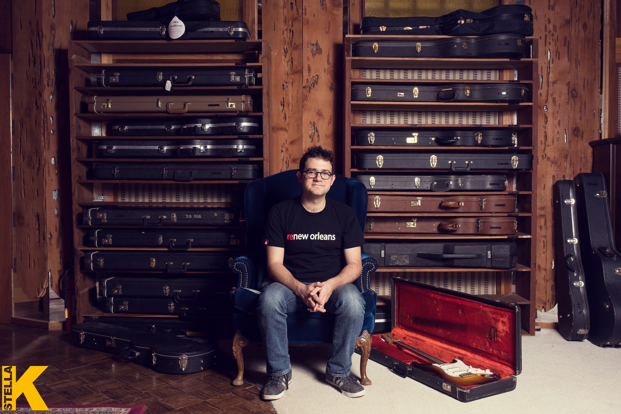 Snarky Puppy guitarist, Bob Lanzetti sitting infront of guitars