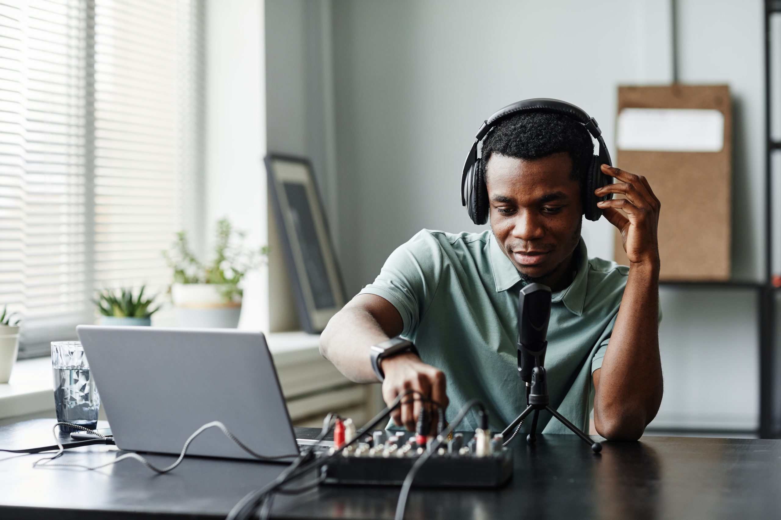 Man using his home recording studio