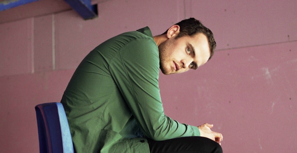 Jordan Rakei press photo in chair