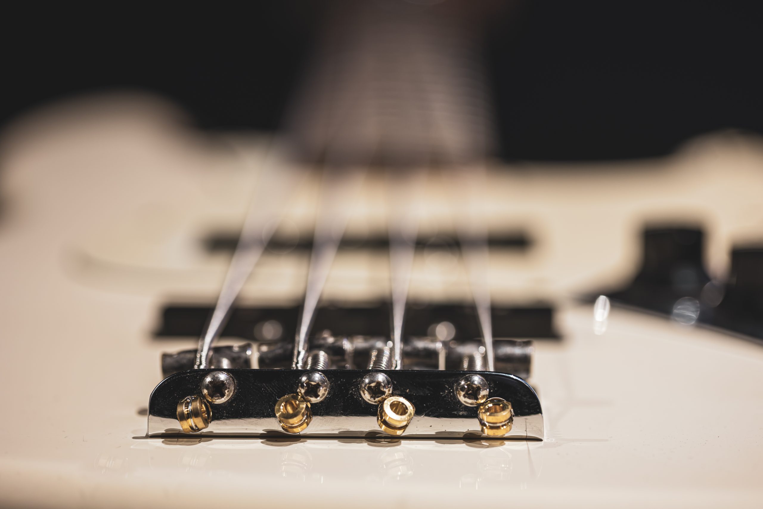 closeup of bass guitar pickup from bottom