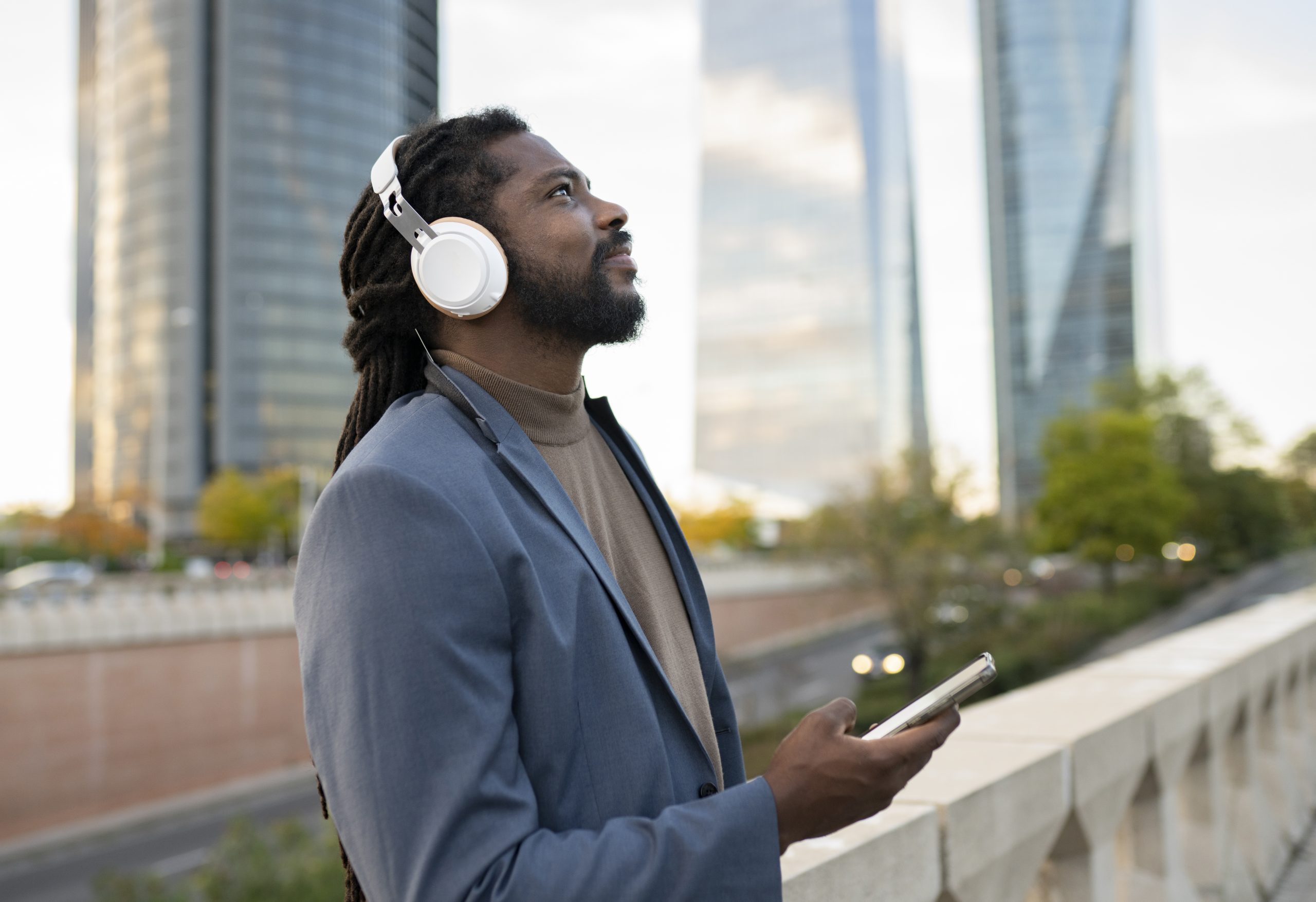 man doing music business with headphones